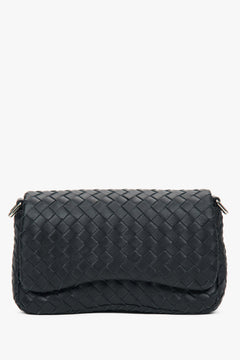 Small black women’s shoulder bag made of woven genuine leather.