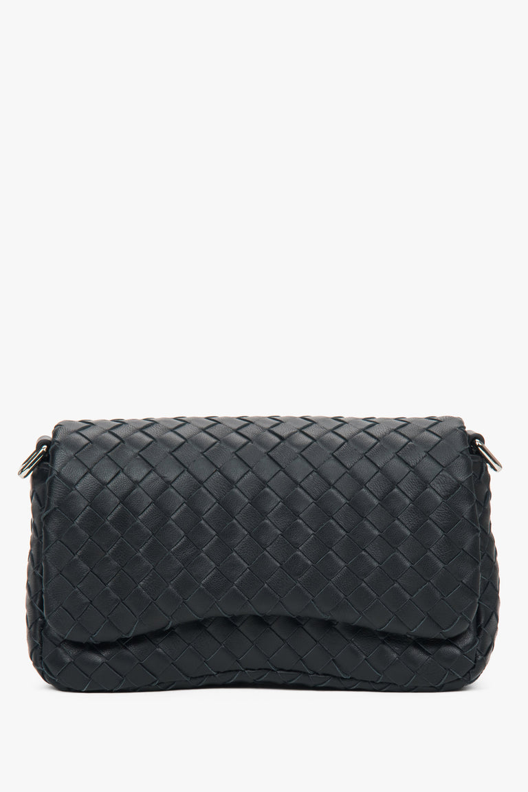 Small black women’s shoulder bag made of woven genuine leather.