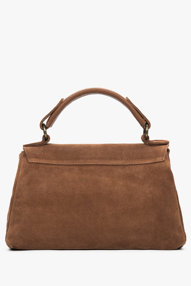 Side view of the handbag showcasing its compact shape, soft texture, and practical depth for everyday essentials.