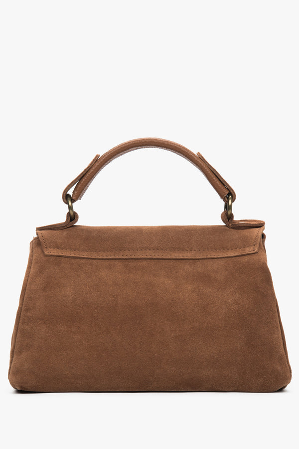 Side view of the handbag showcasing its compact shape, soft texture, and practical depth for everyday essentials.