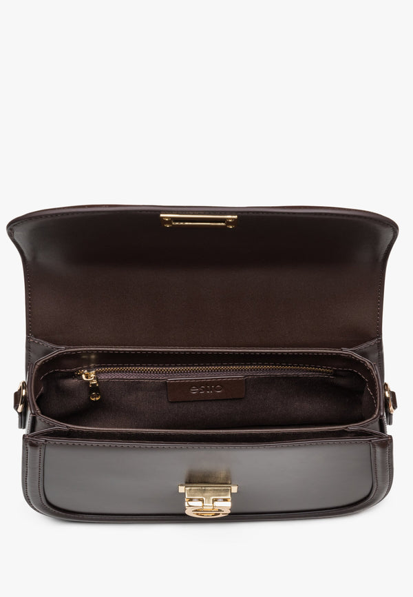 Women's brown leather handy handbag - close-up of the interior.
