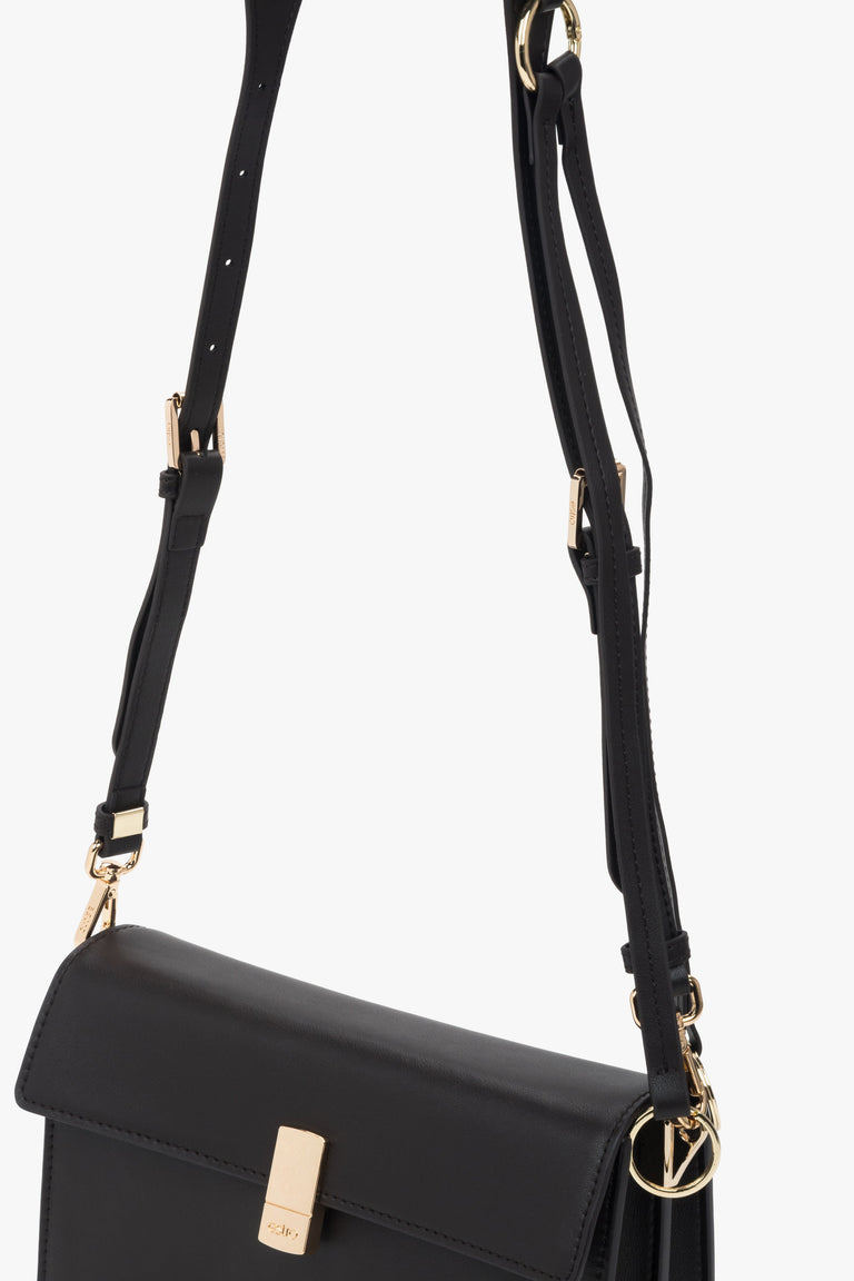 Compact women’s crossbody bag in dark brown leather with gold hardware, Estro.
