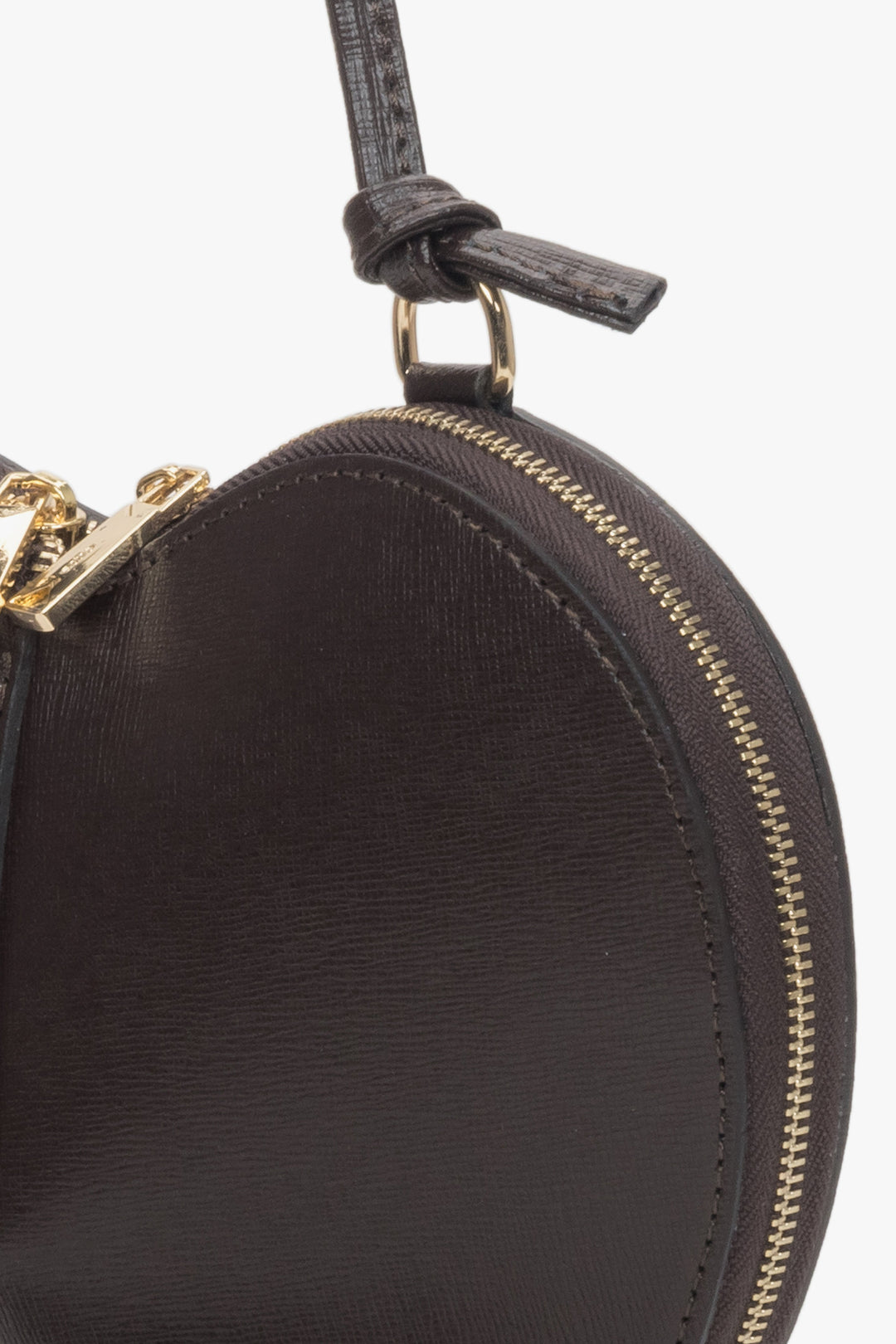 Women's small dark brown heart-shaped handbag made of genuine leather.
