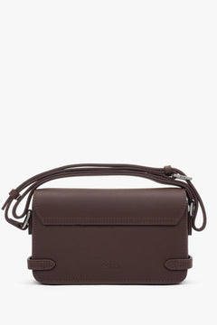 Small dark brown women’s leather shoulder bag.