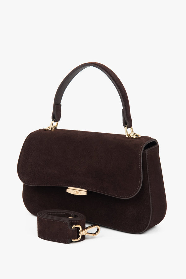 Small dark brown women’s satchel handbag made of genuine velour.