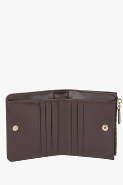 Small dark brown women’s wallet made of genuine leather.