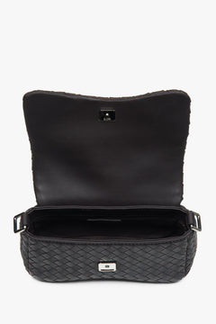 Women’s small dark brown shoulder bag made of woven genuine leather by Estro.