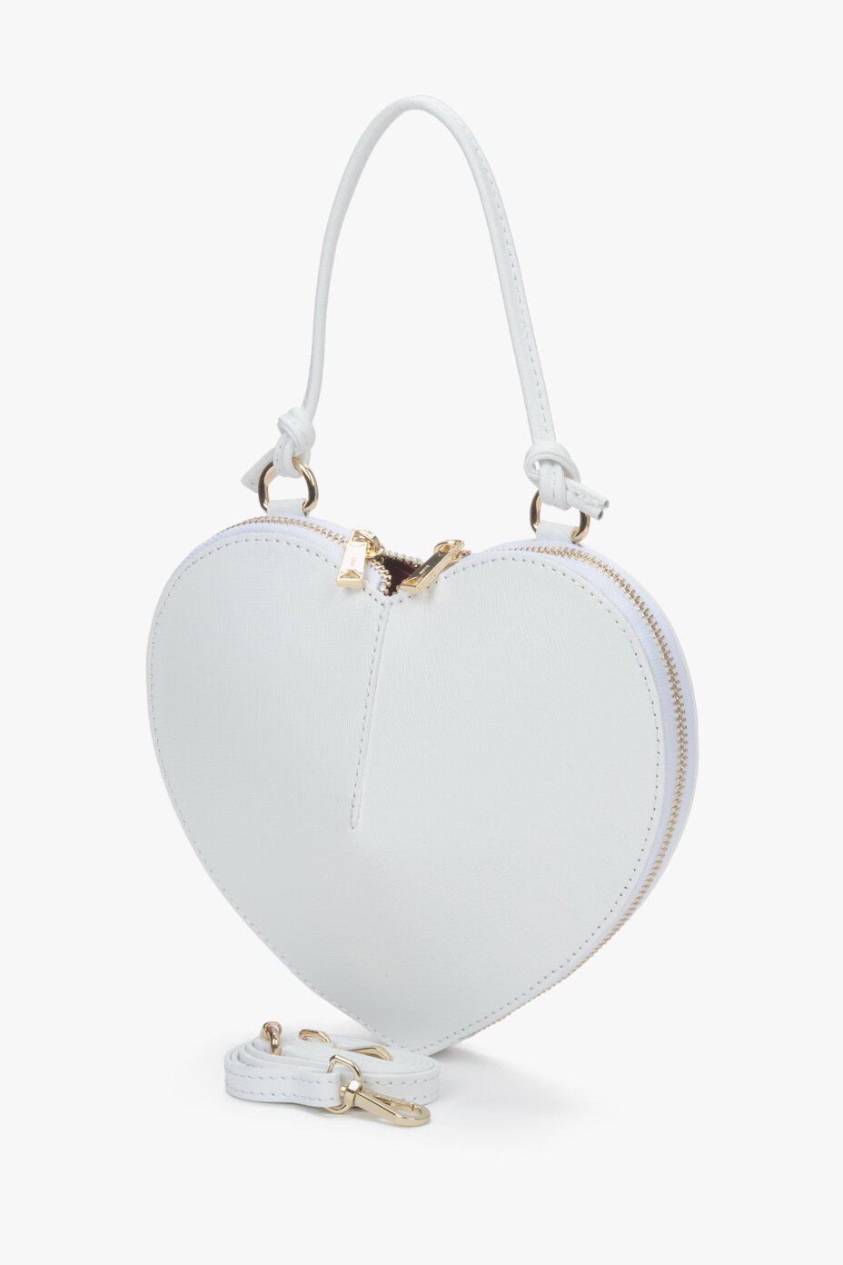 Heart-shaped handbag with gold accents.