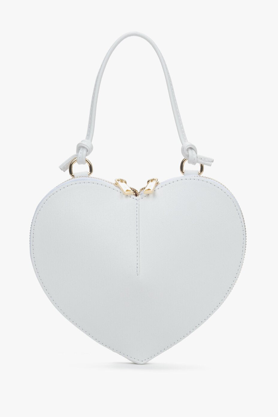 Heart-shaped white handbag with gold accents by Estro.