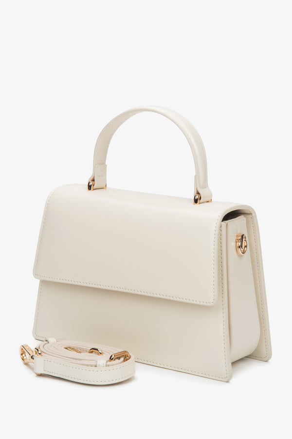 Elegant milky beige leather satchel for women with a structured silhouette.