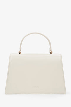 Small light beige leather handbag featuring a gold-tone snap closure and leather lining.