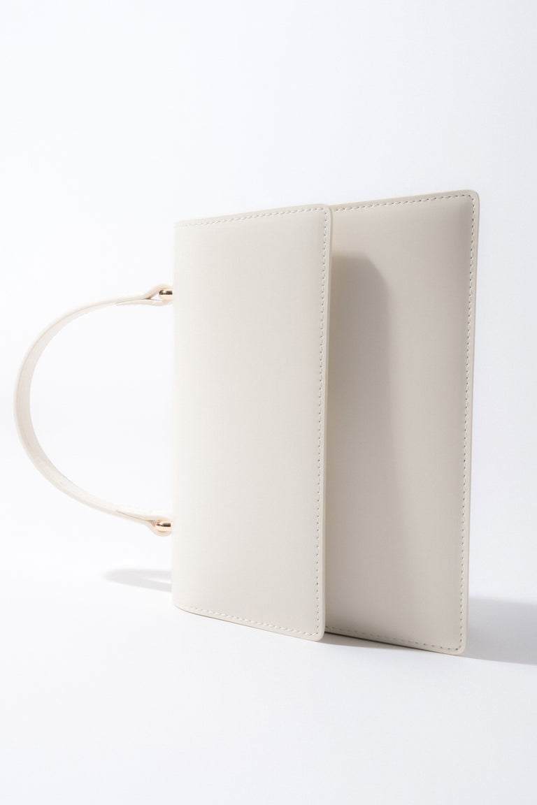 Women’s small milky beige natural leather satchel bag with gold hardware, Estro.