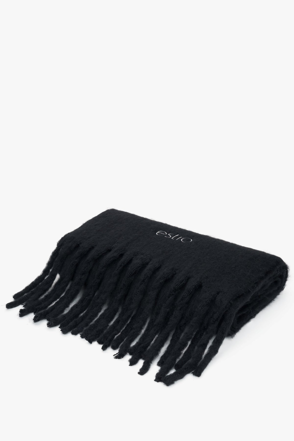 Warm, chunky black women's scarf by Estro with fringes.