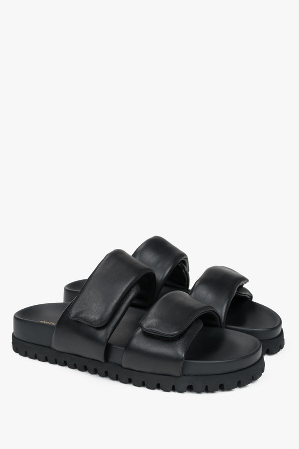 Comfortable black women's slides by Estro, made from genuine leather and featuring soft straps for added comfort.