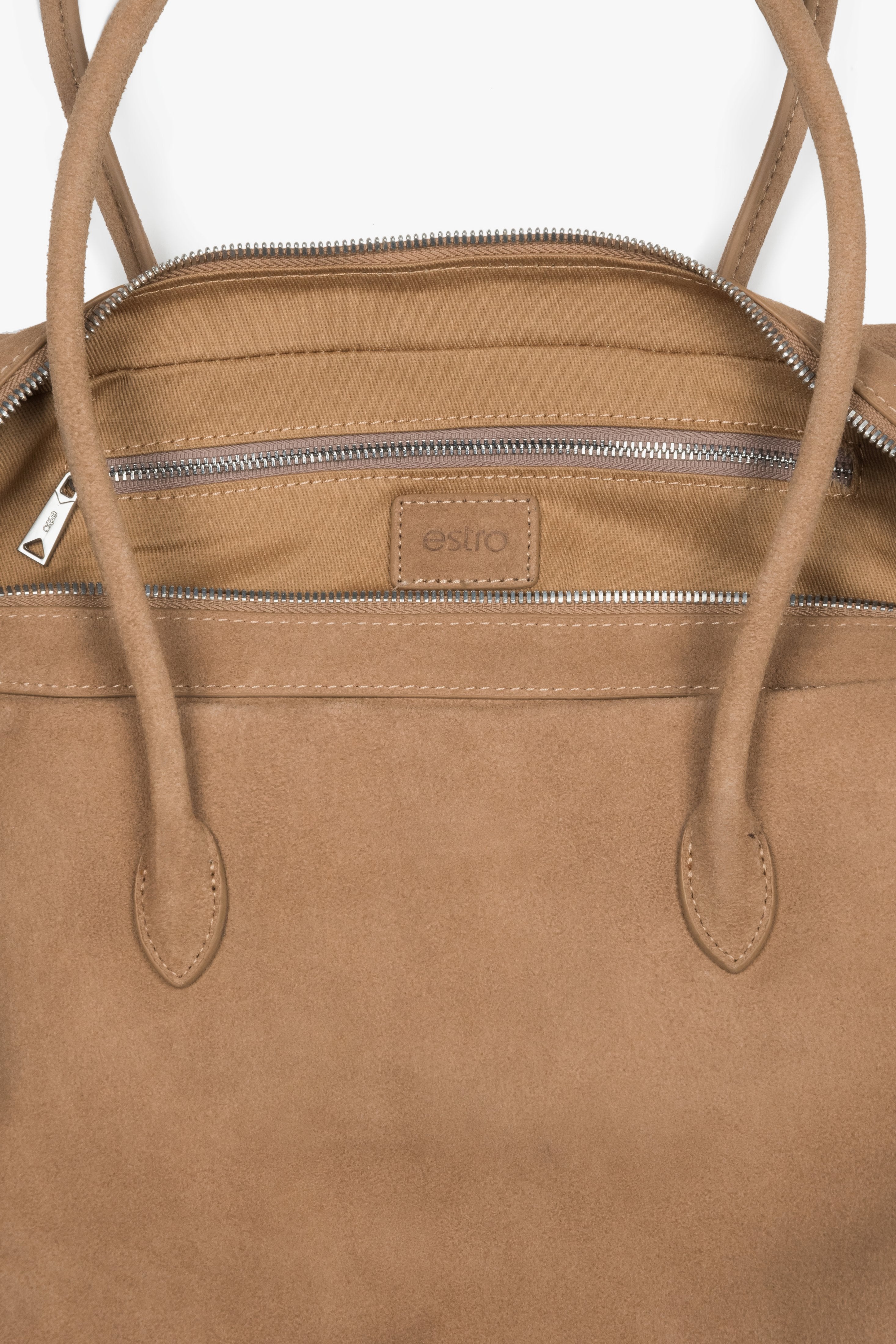 Close-up of the premium natural velour texture on a large beige tote bag.
