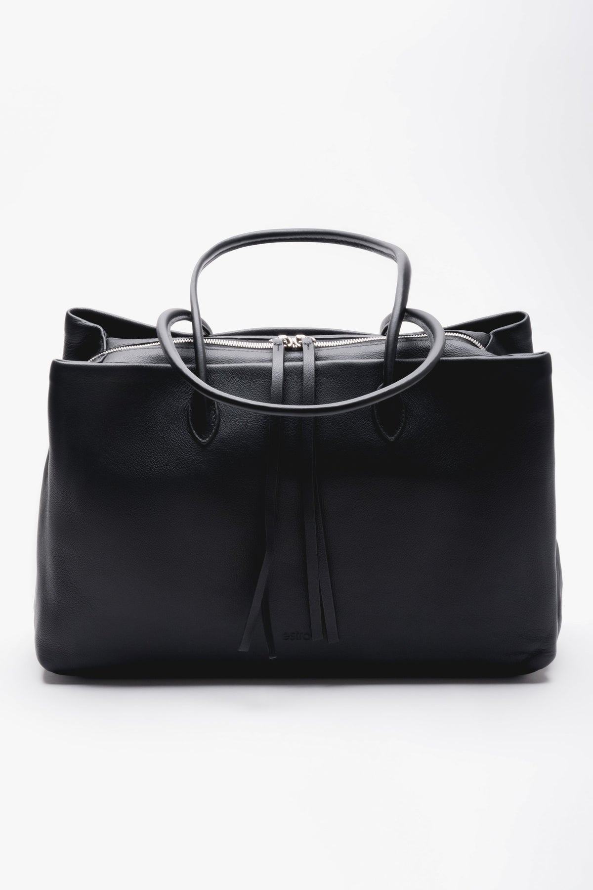 Spacious black women's bag with three compartments. Made of natural leather with attention to detail.