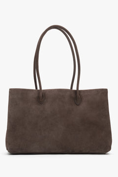 Estro women's dark brown velour handbag with long handles for shoulder carry.