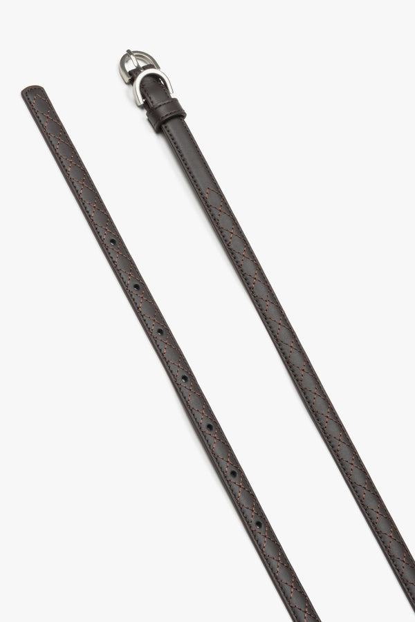 Embossed braided pattern on a dark brown natural leather belt.