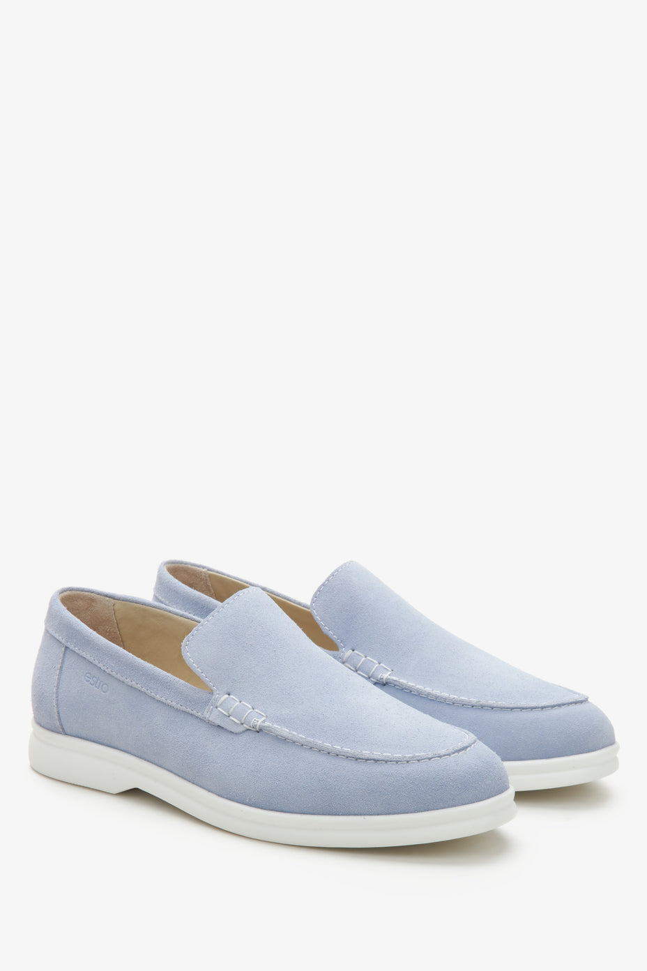 Side profile of light blue Italian velour loafers.