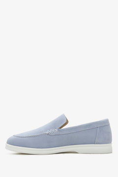 Close-up of soft light blue Italian velour texture.