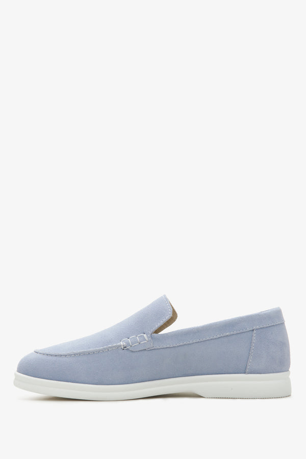 Close-up of soft light blue Italian velour texture.