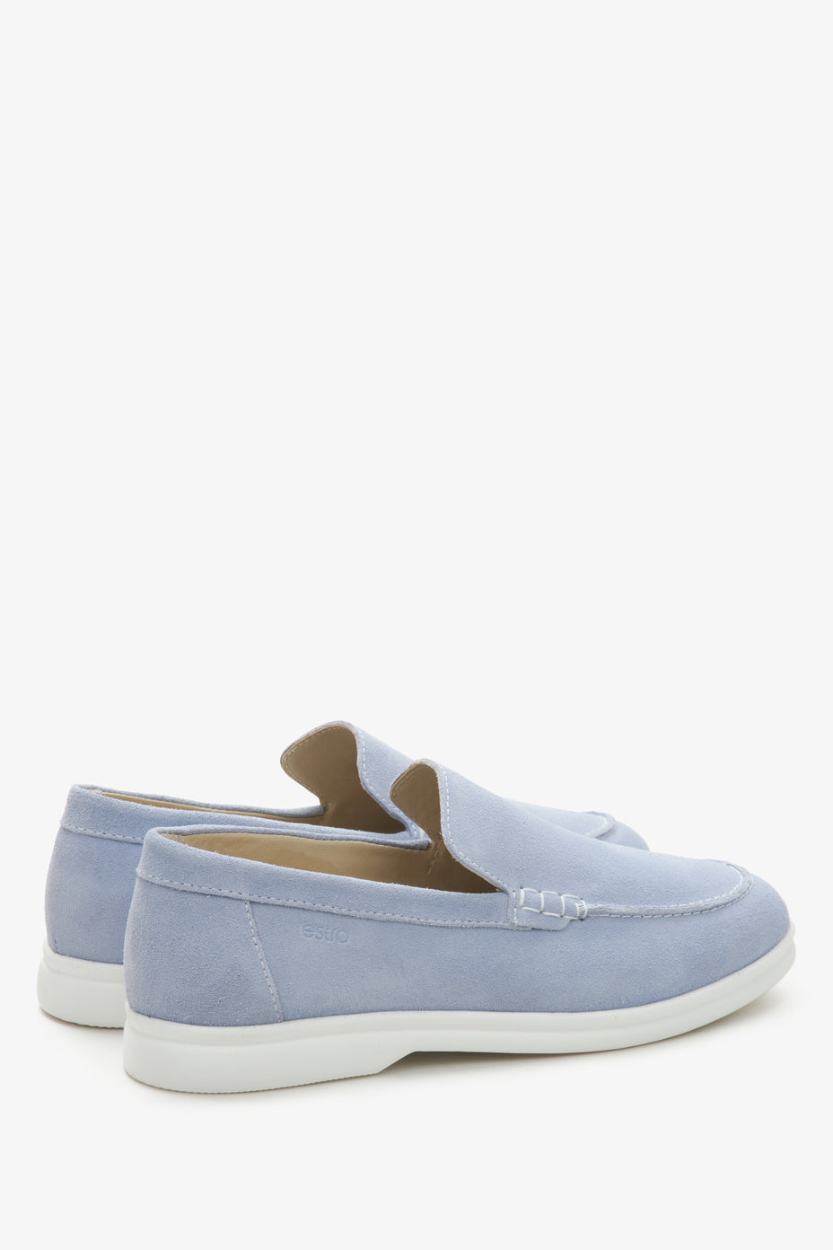 Heel and back view of light blue velour loafers.