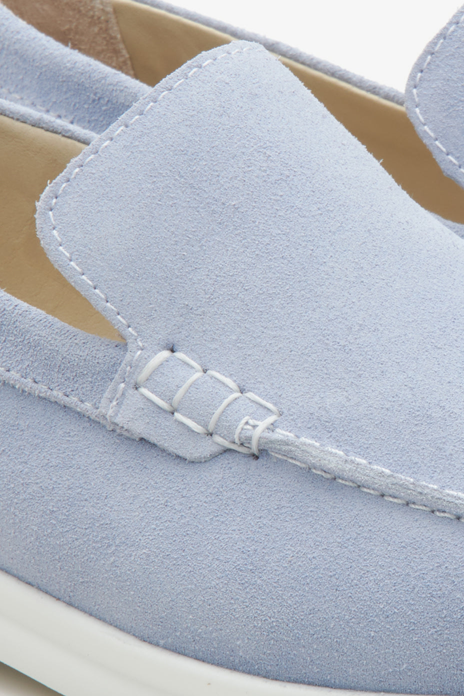 Close-up of soft light blue Italian velour texture.