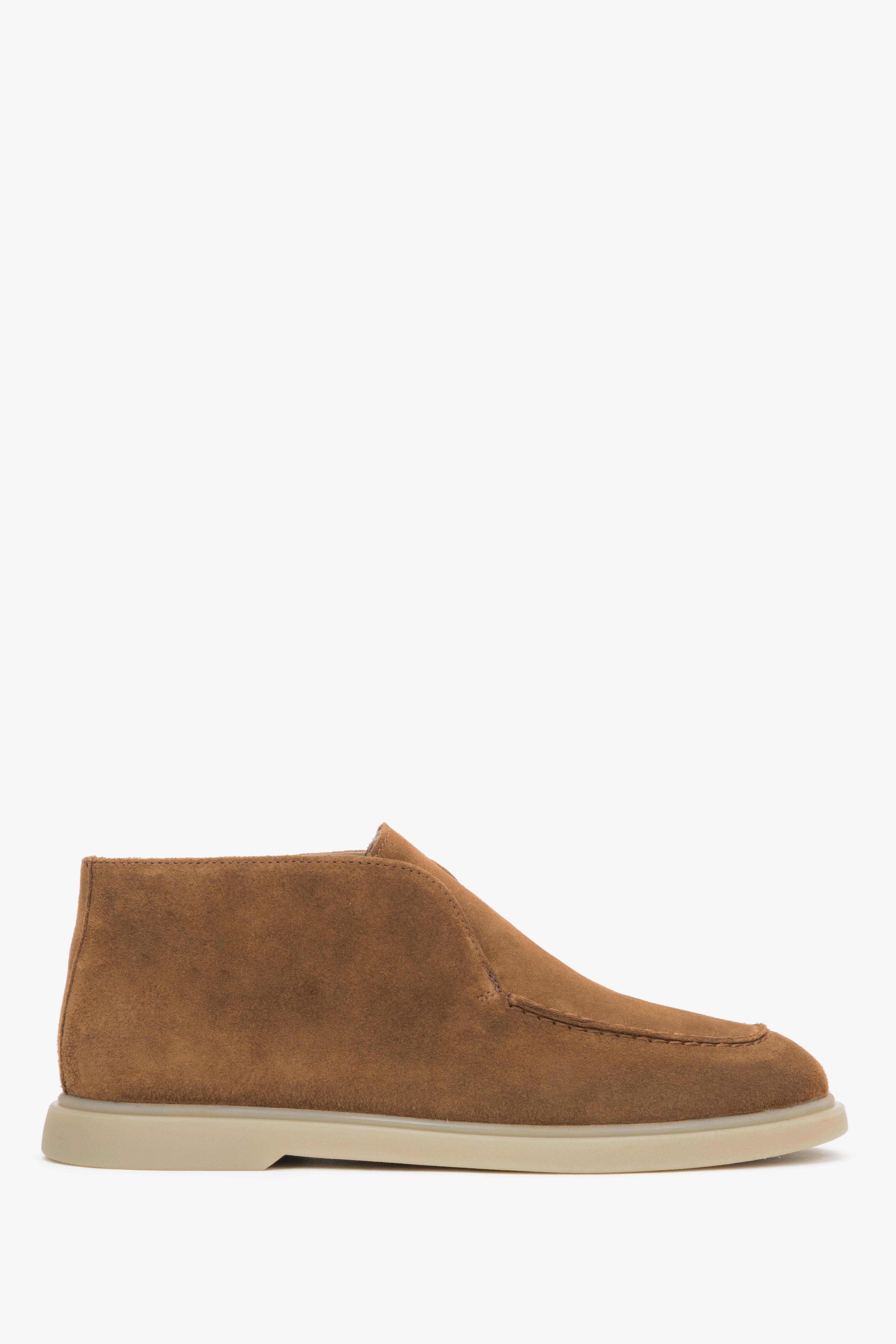 Brown slip-on women’s platform shoes by Estro.