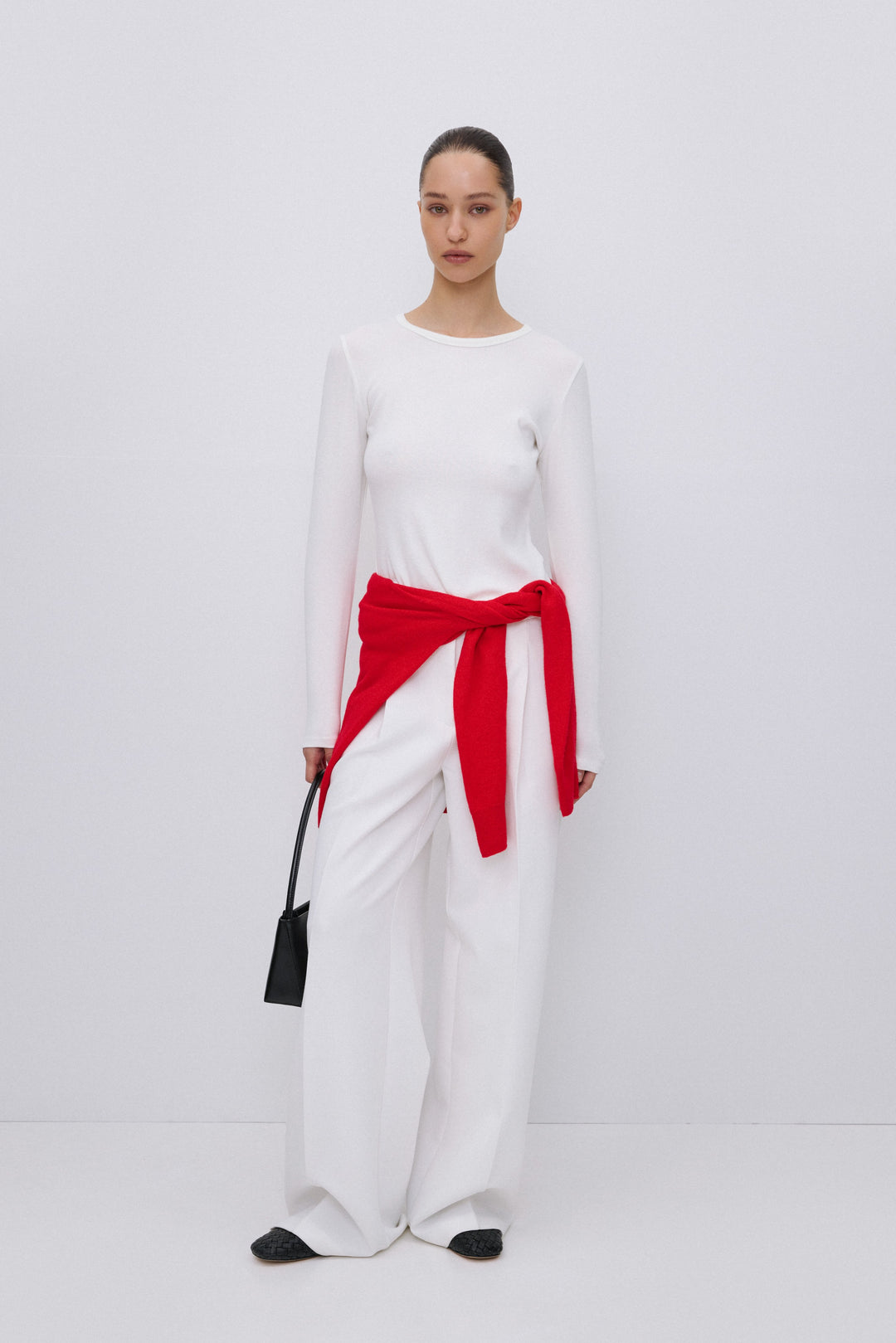 White basic long sleeve top for women.