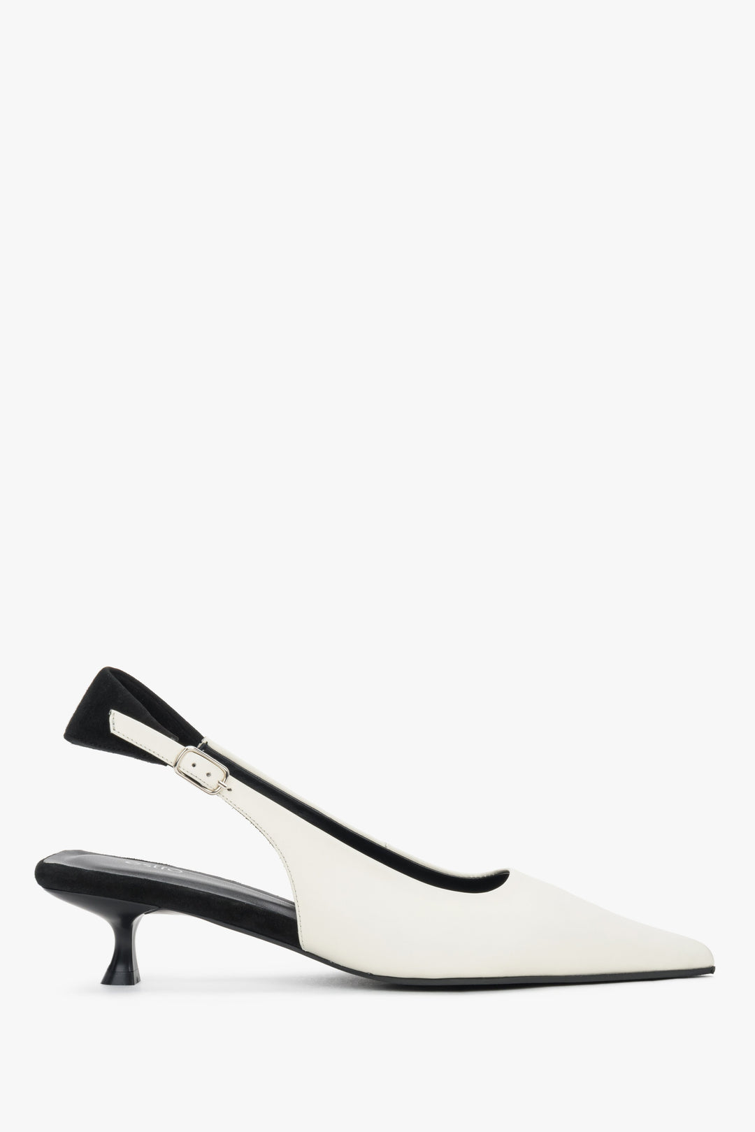 Women’s white and black leather slingback heels by Estro with pointed toe.