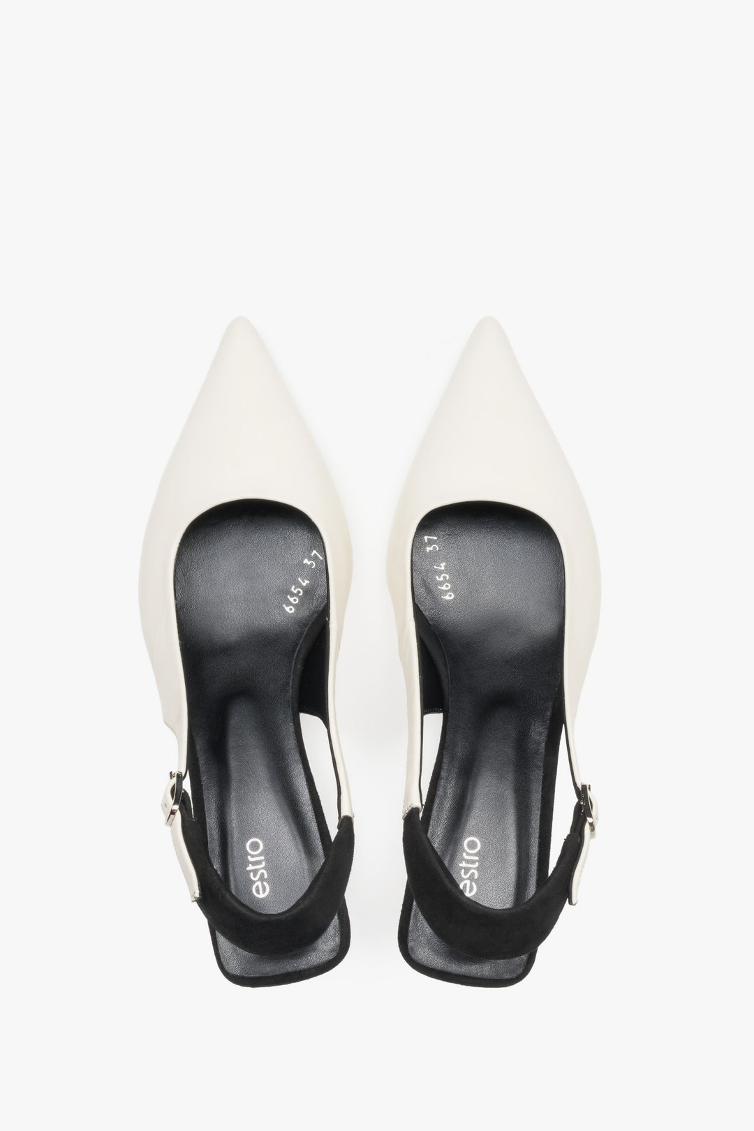Top view of women’s white and black leather slingback heels by Estro.