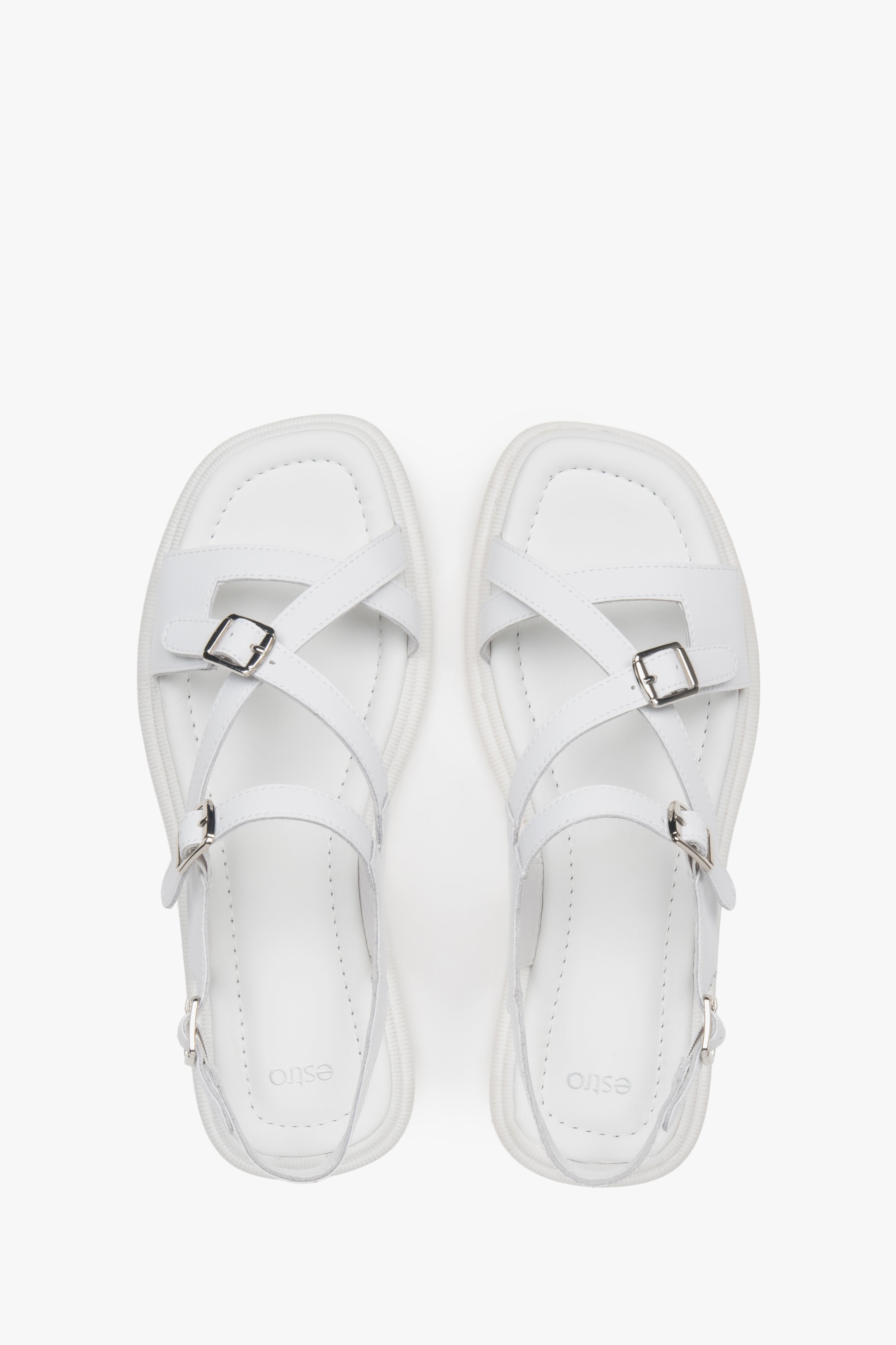 Women’s white flat sandals in genuine leather by Estro.