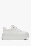 White and grey velour sneakers with chunky sole.