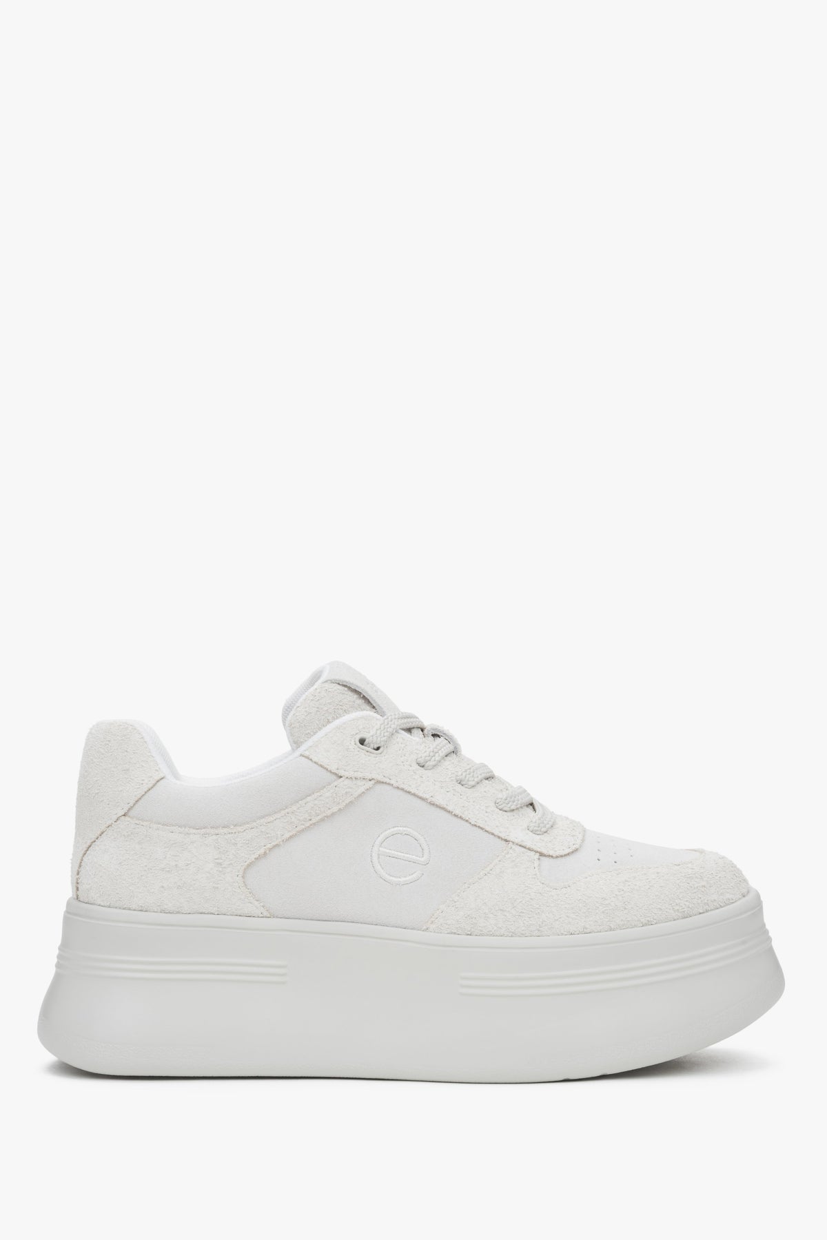 White and grey velour sneakers with chunky sole.