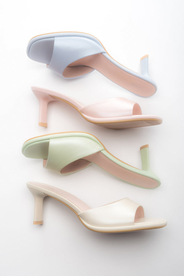 Women’s leather heeled mules – color options.