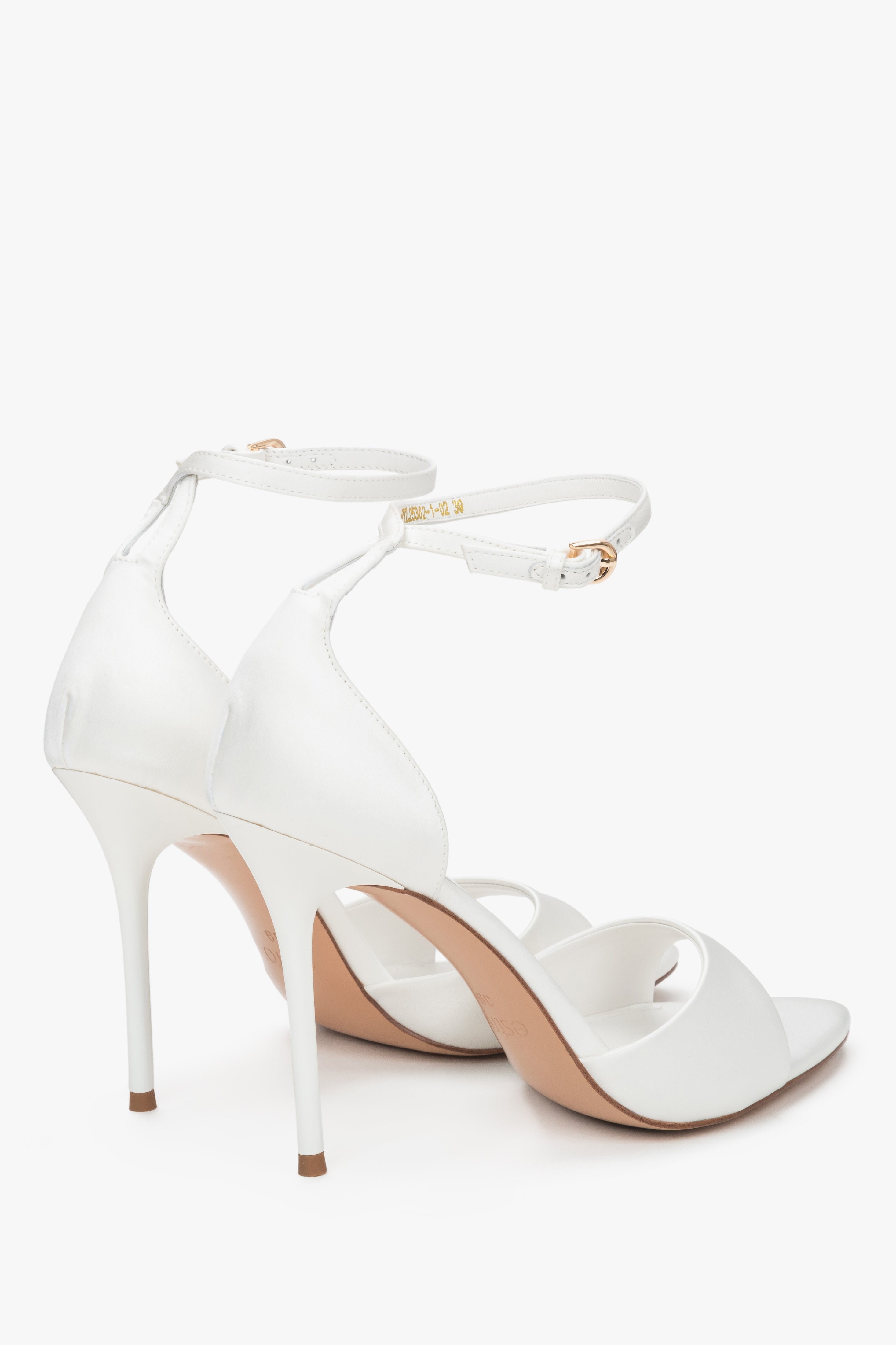 Back view of women's white high heel sandals with ankle strap