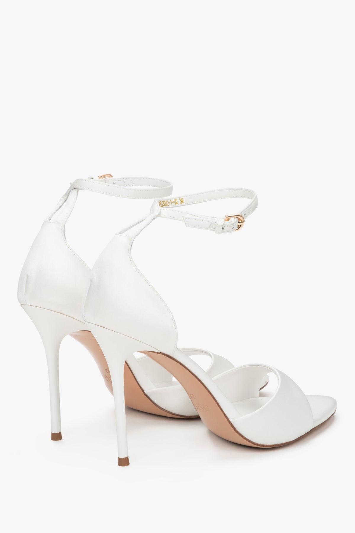 Back view of women's white high heel sandals with ankle strap