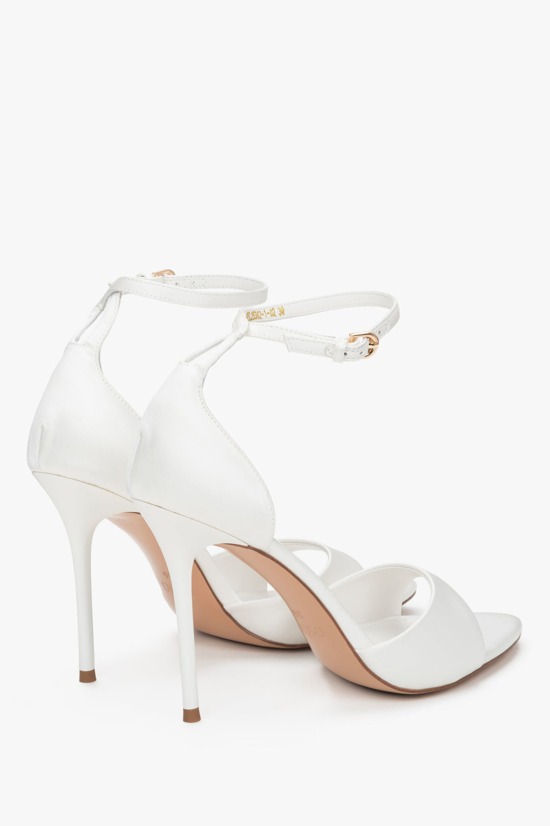 Back view of women's white high heel sandals with ankle strap
