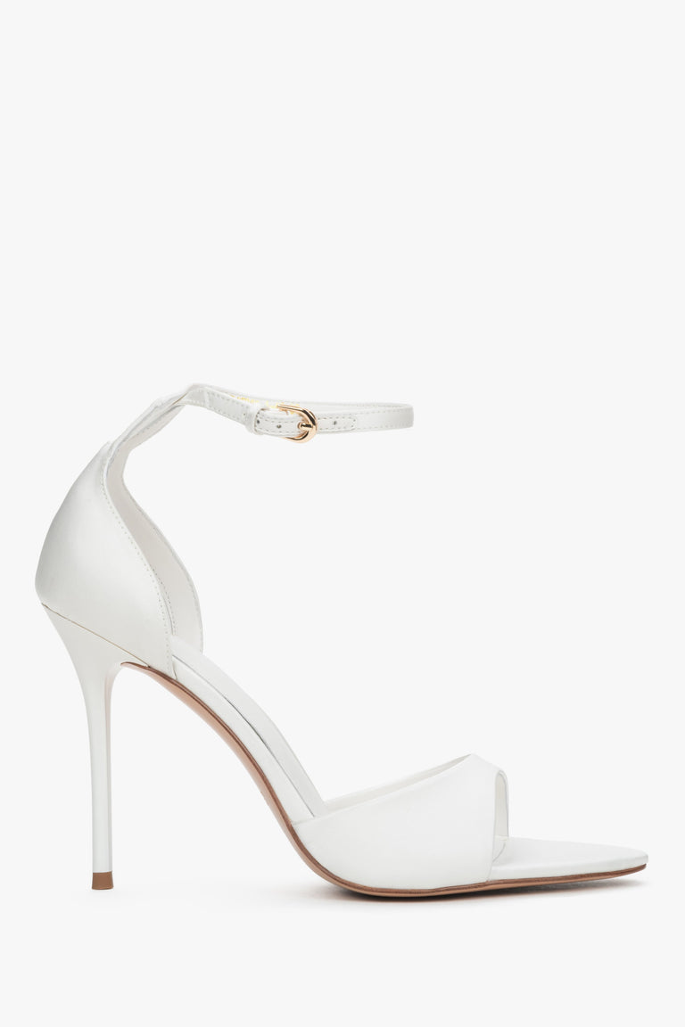 Side view of women's white high heel sandals by Estro