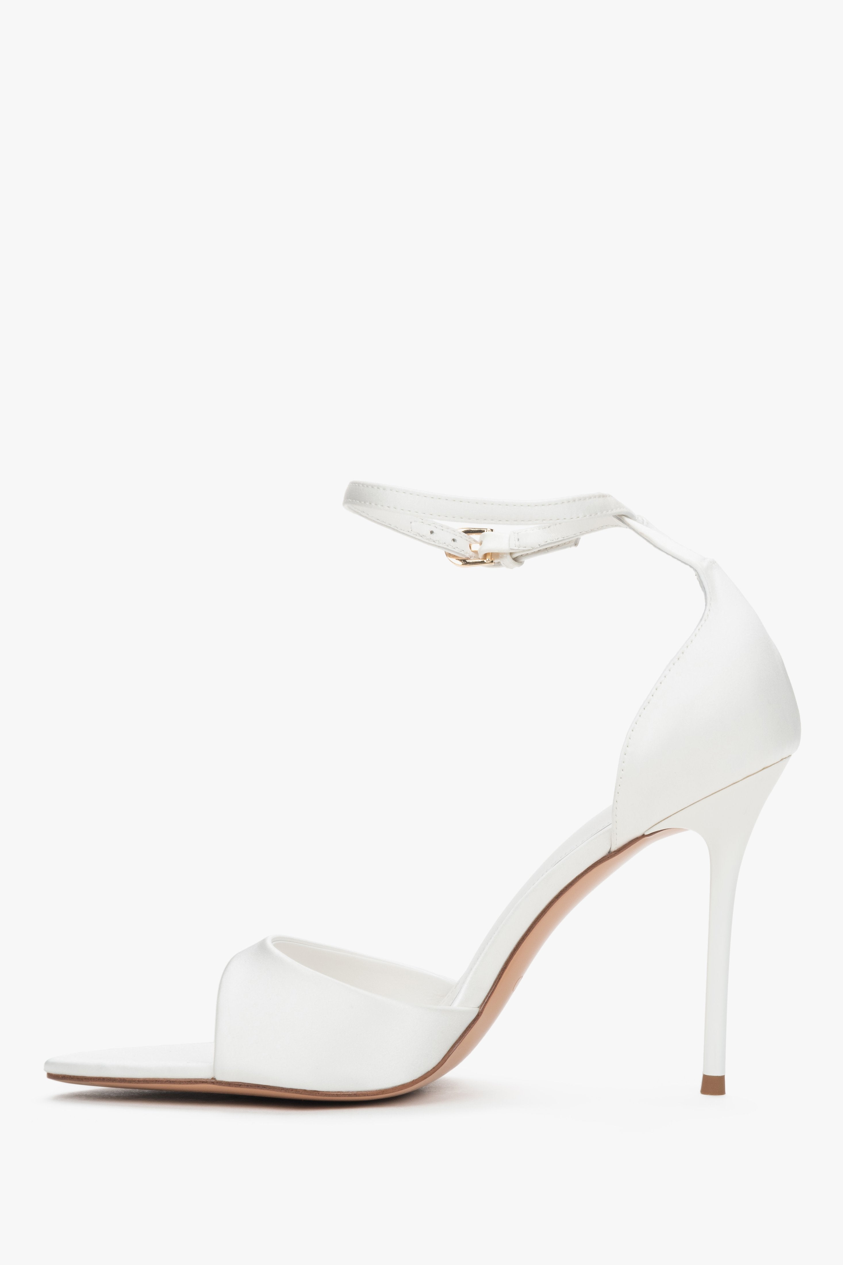 Single white high heel sandal with ankle strap by Estro