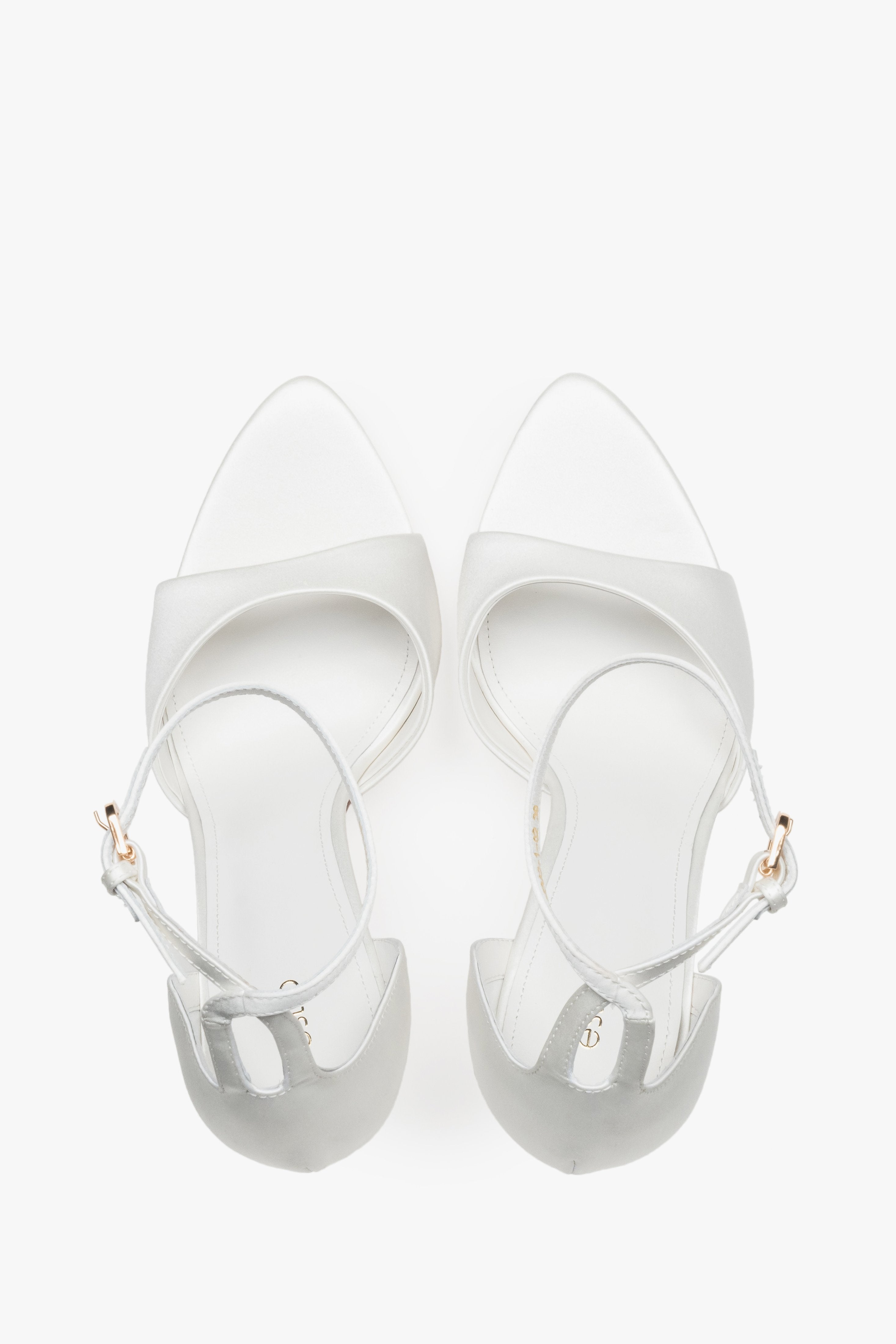 Top view of women's white high heel sandals by Estro