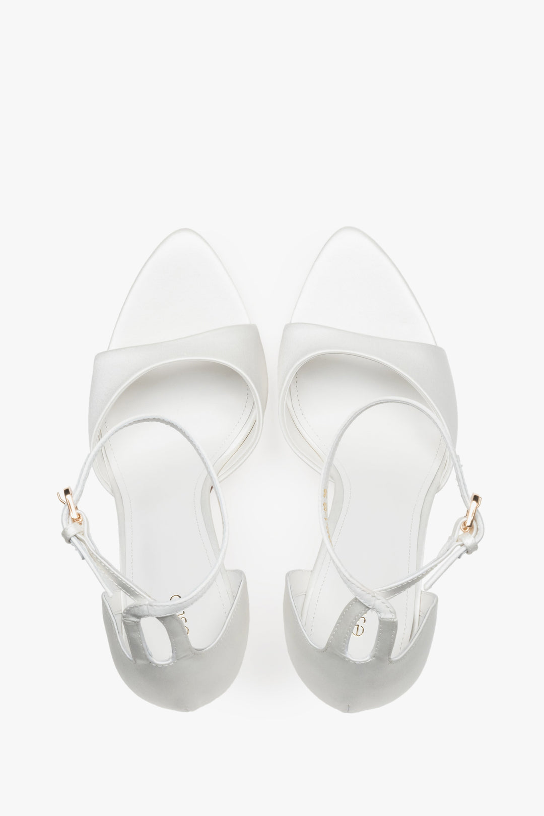 Top view of women's white high heel sandals by Estro