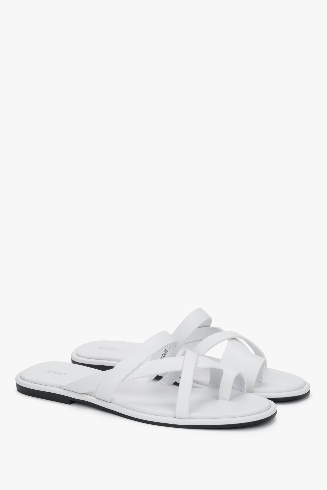 White women's leather slide sandals with crossed straps and toe loop, Estro.