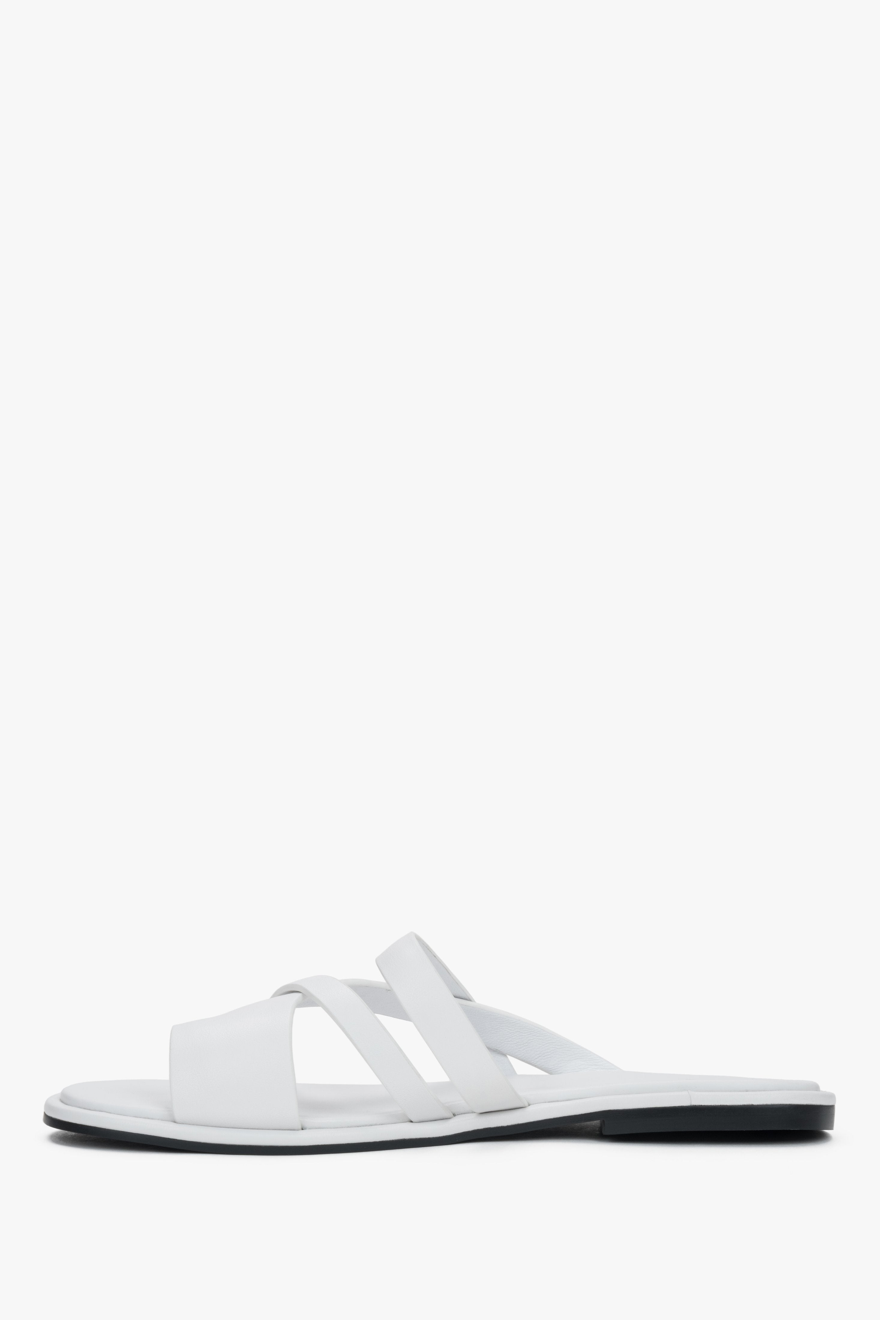 Elegant white genuine leather flat slides with a comfortable toe ring.
