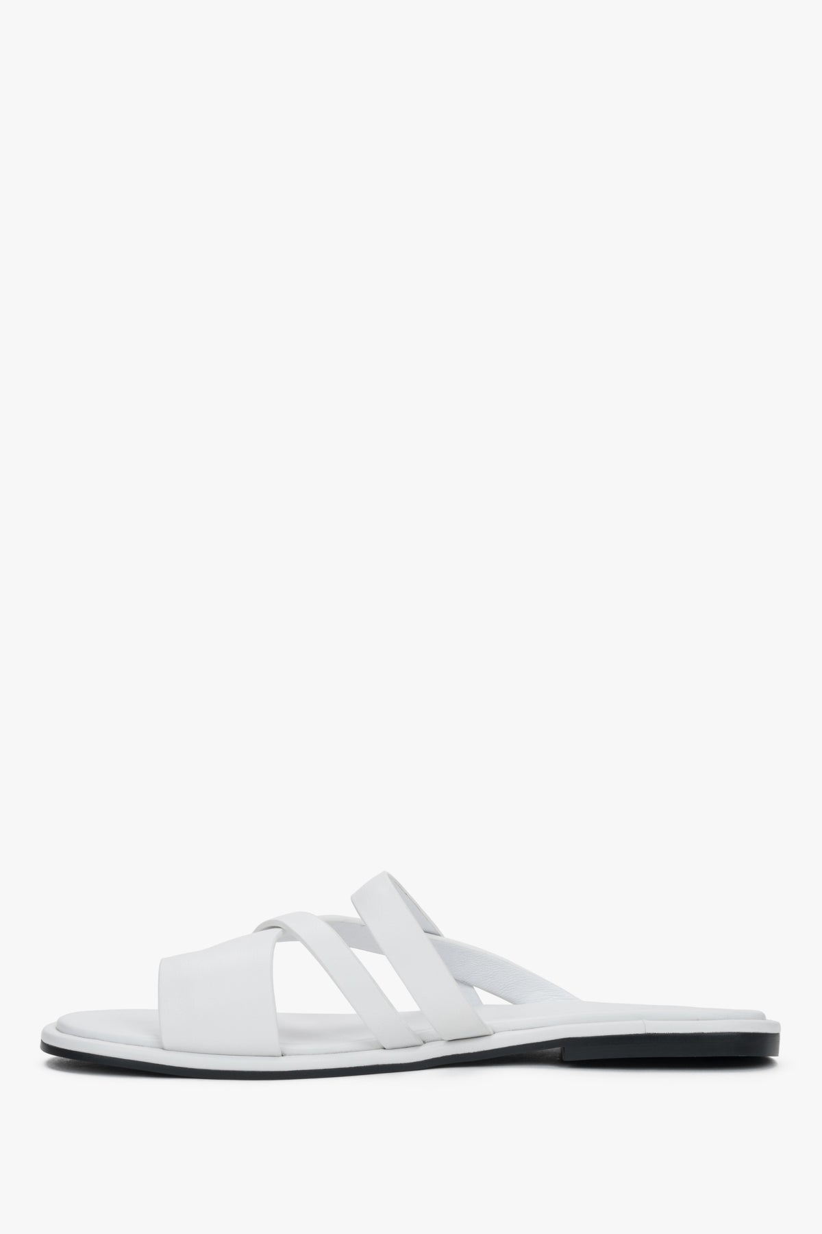 Elegant white genuine leather flat slides with a comfortable toe ring.