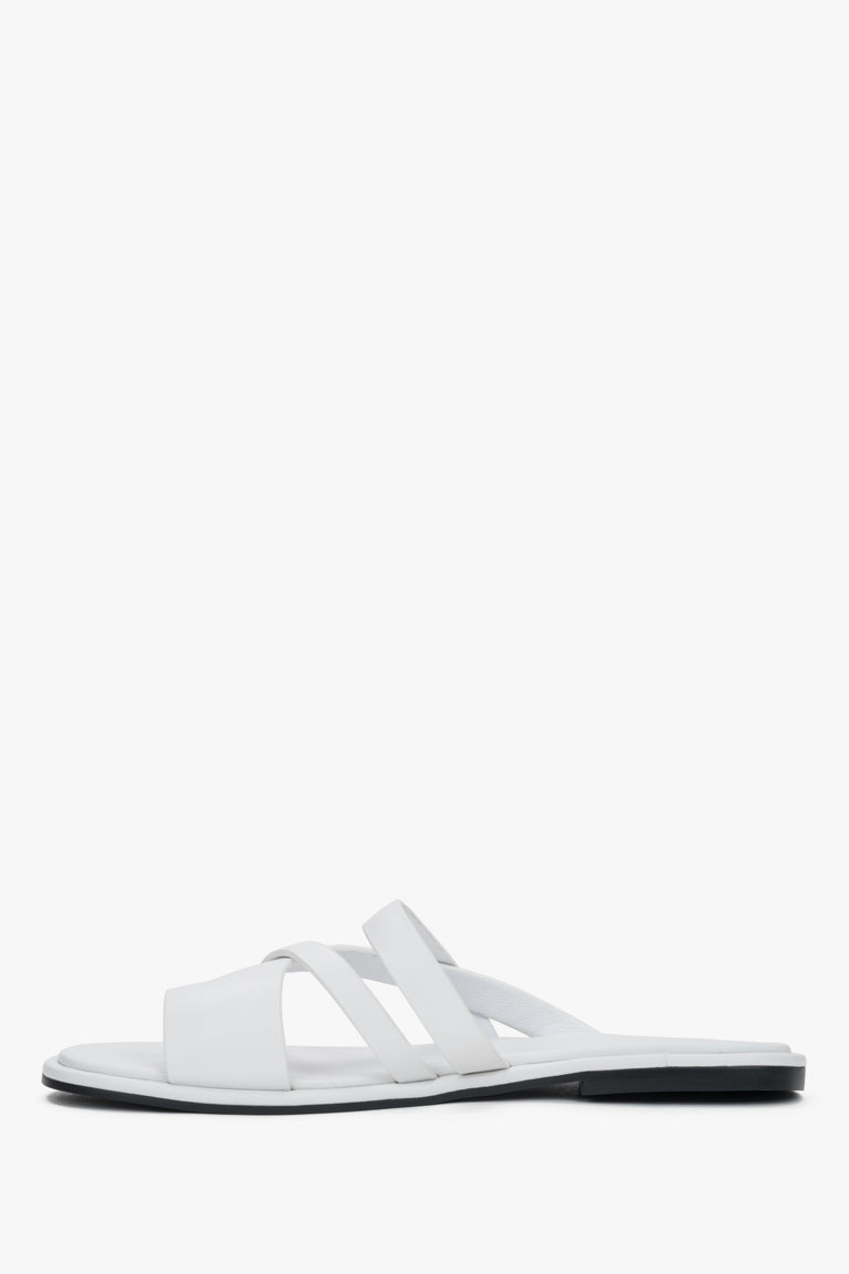 Elegant white genuine leather flat slides with a comfortable toe ring.