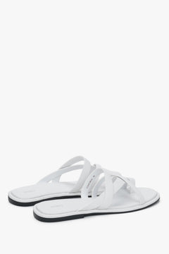 Estro white summer slide sandals featuring a premium chevro leather insole.