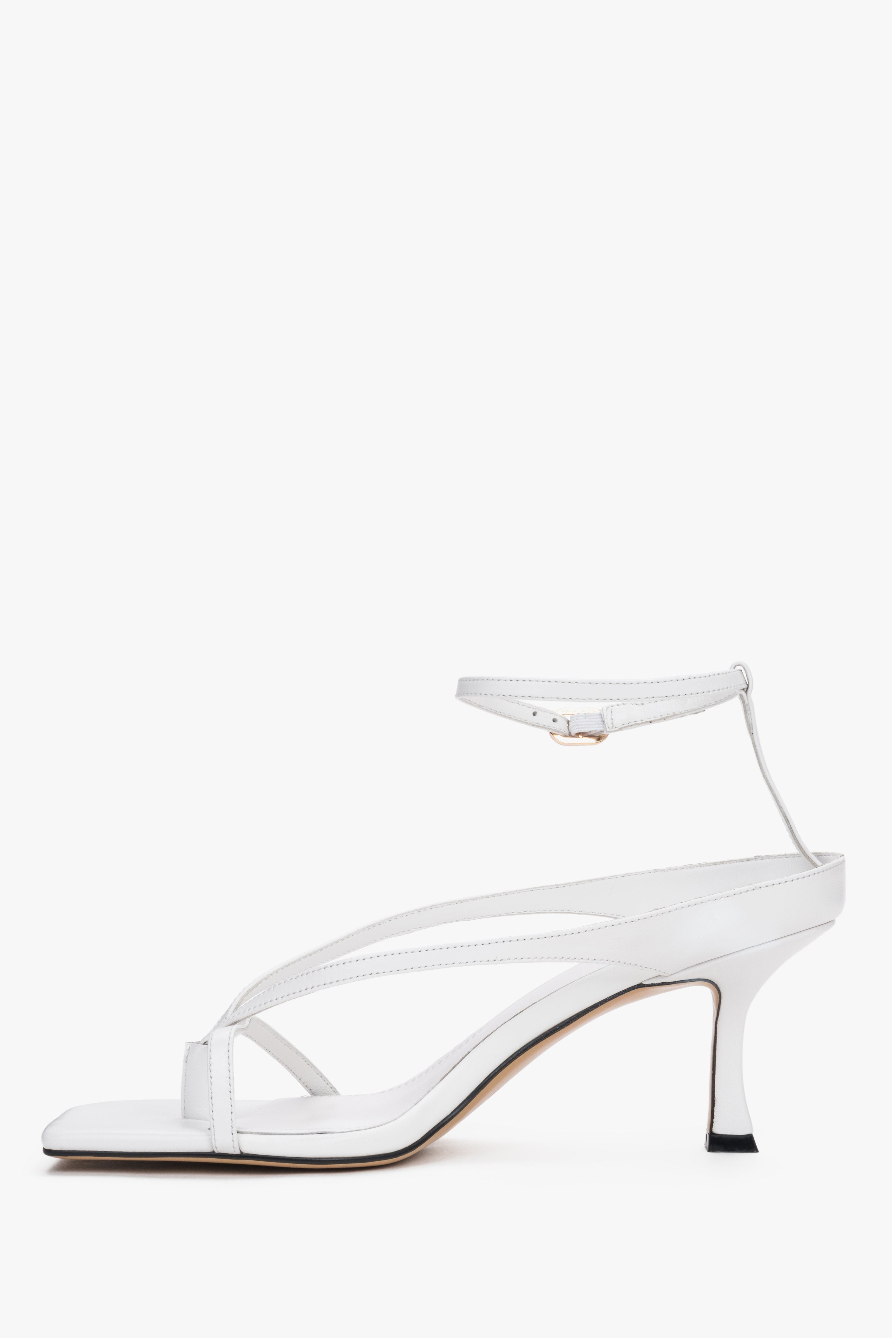White leather thong-strap heeled sandals with a square toe, summer style.
