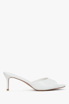 Side view of women's white leather heeled mules by Estro
