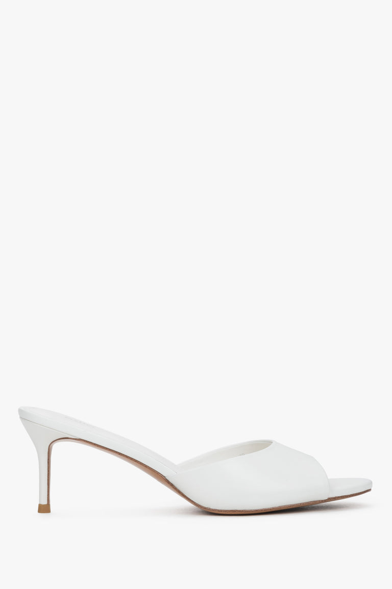 Side view of women's white leather heeled mules by Estro